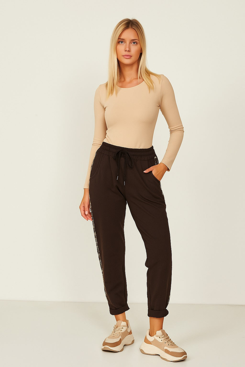 Trousers with side rhinestone band in leopard pattern
